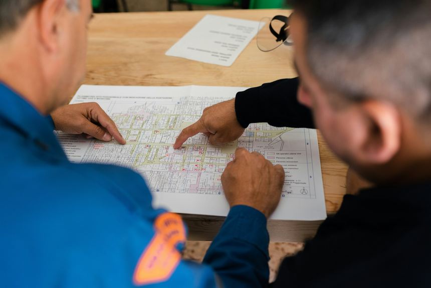 Team reviewing a physical plan together